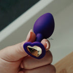 Blush Temptasia Bling Butt Plugs, Purple with Gold Gemstone - 3 Sizes